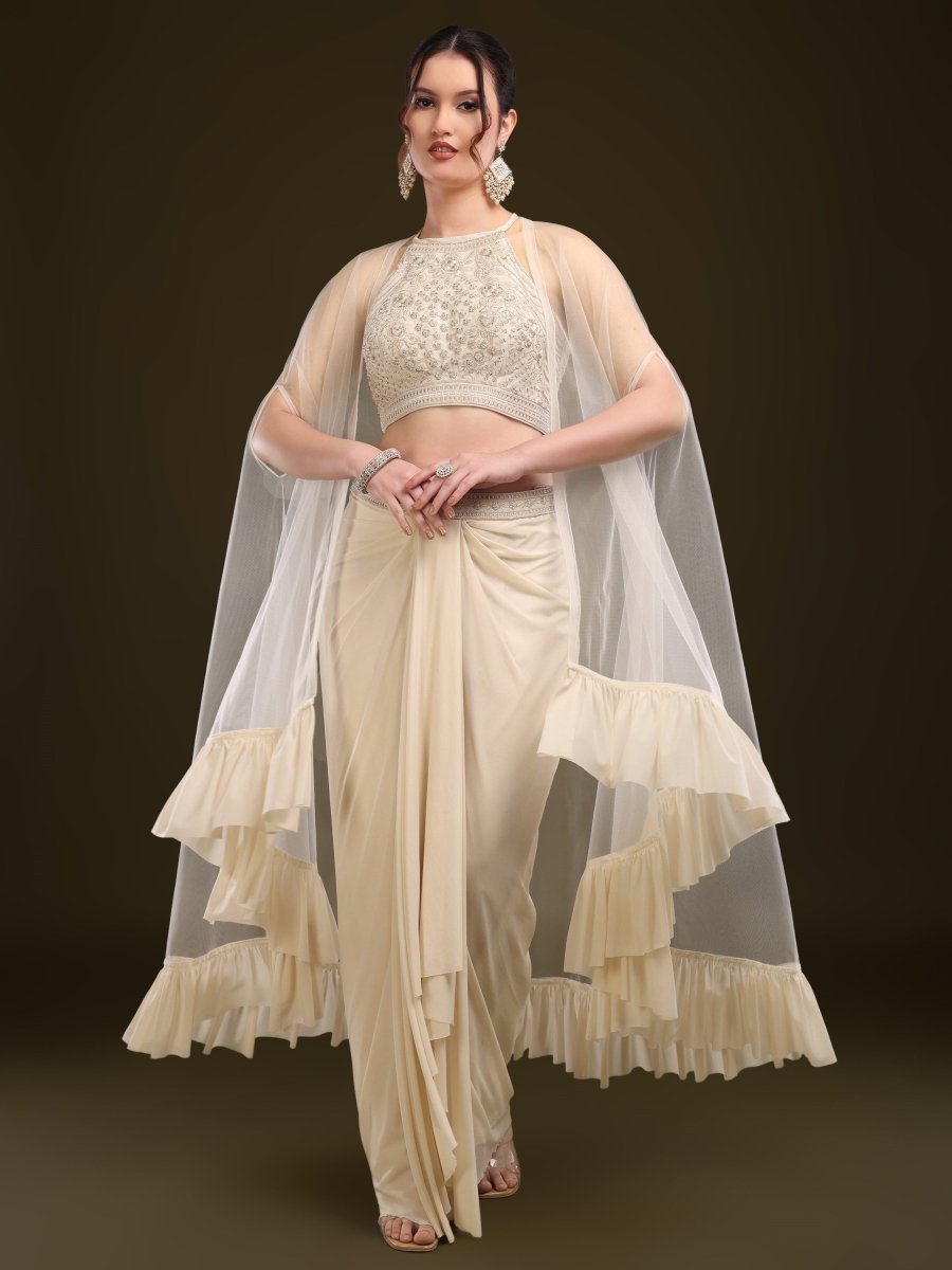 Model seated in rust indo-western embellished palazzo set